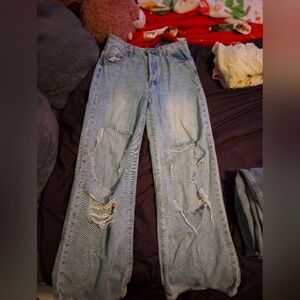 Distressed faded baggy ripped jeans